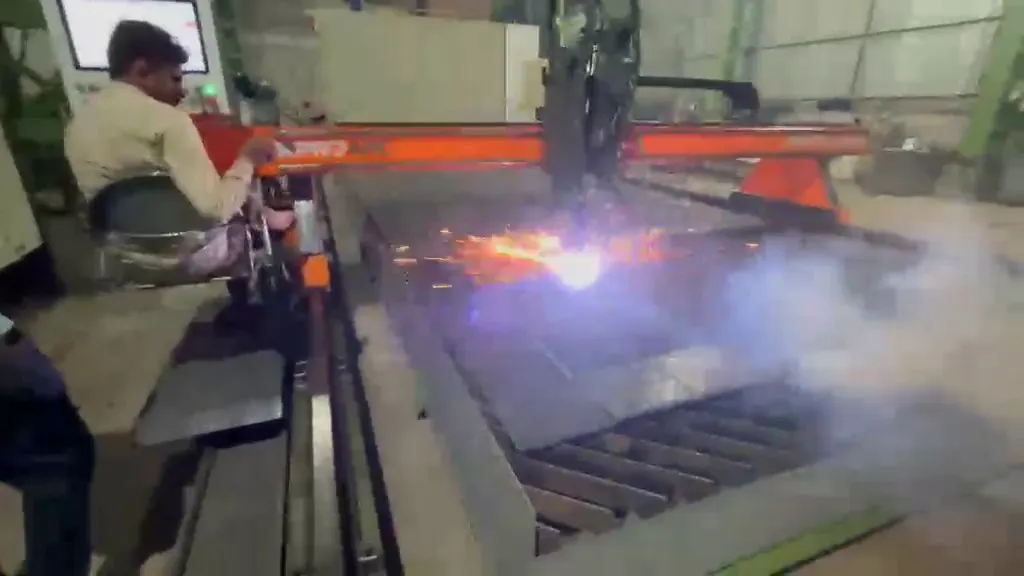 CNC plasma cutting in progress on MS plate
